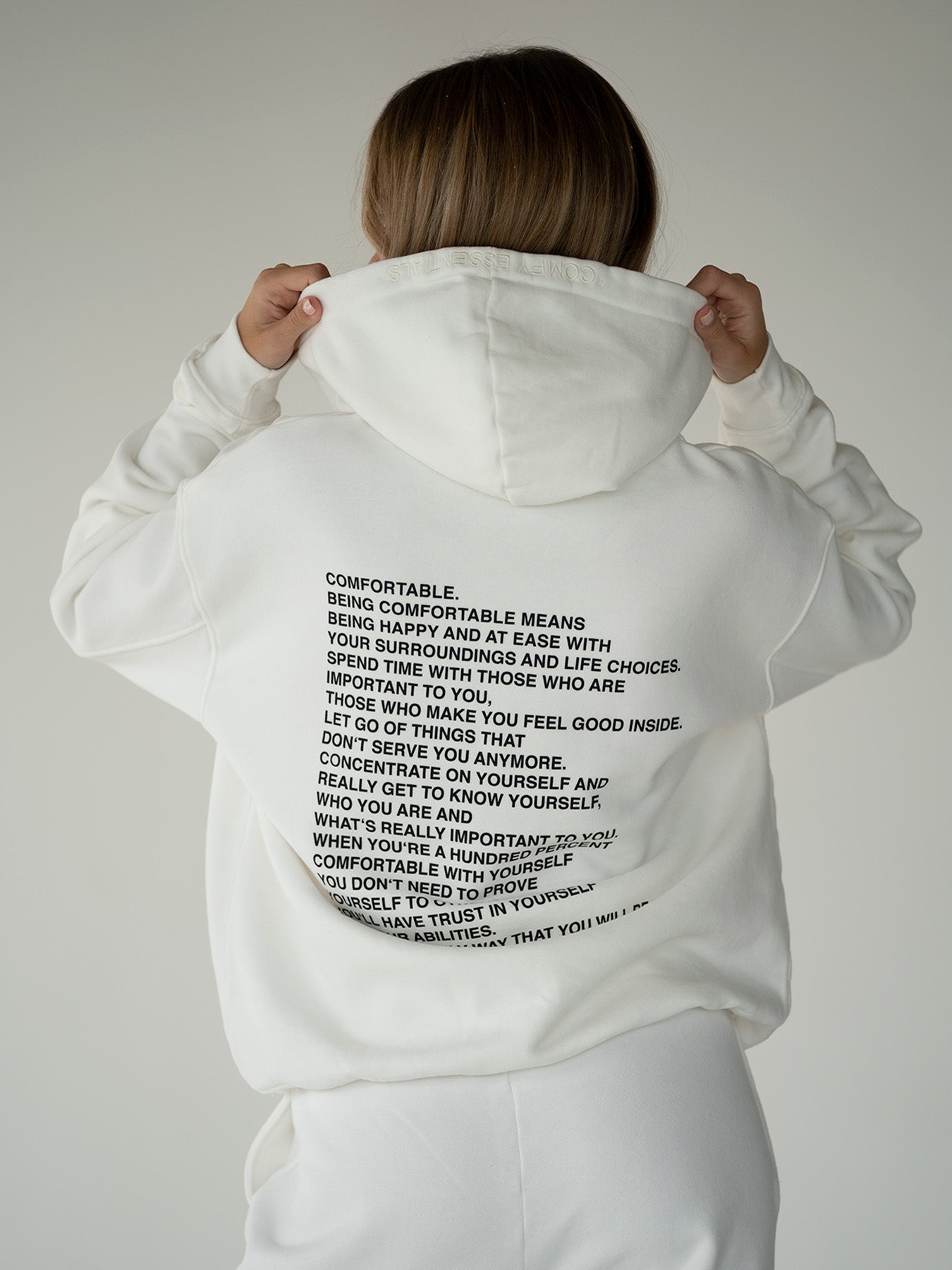 ESSENTIALS Hoodie • Off-White - Main Image