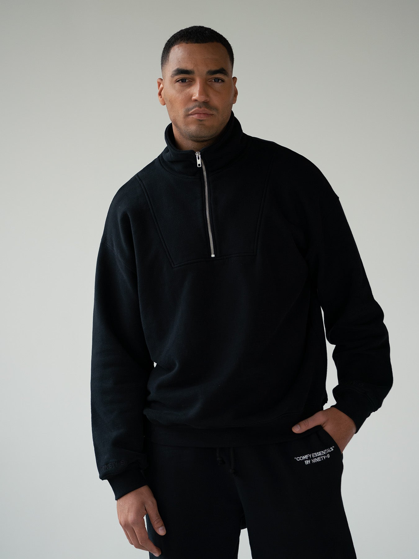 ESSENTIALS - Half-Zip Sweater • Black